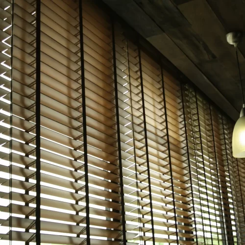 blinds-in-a-home-catching-the-sunlight A full window blinds for the living room.